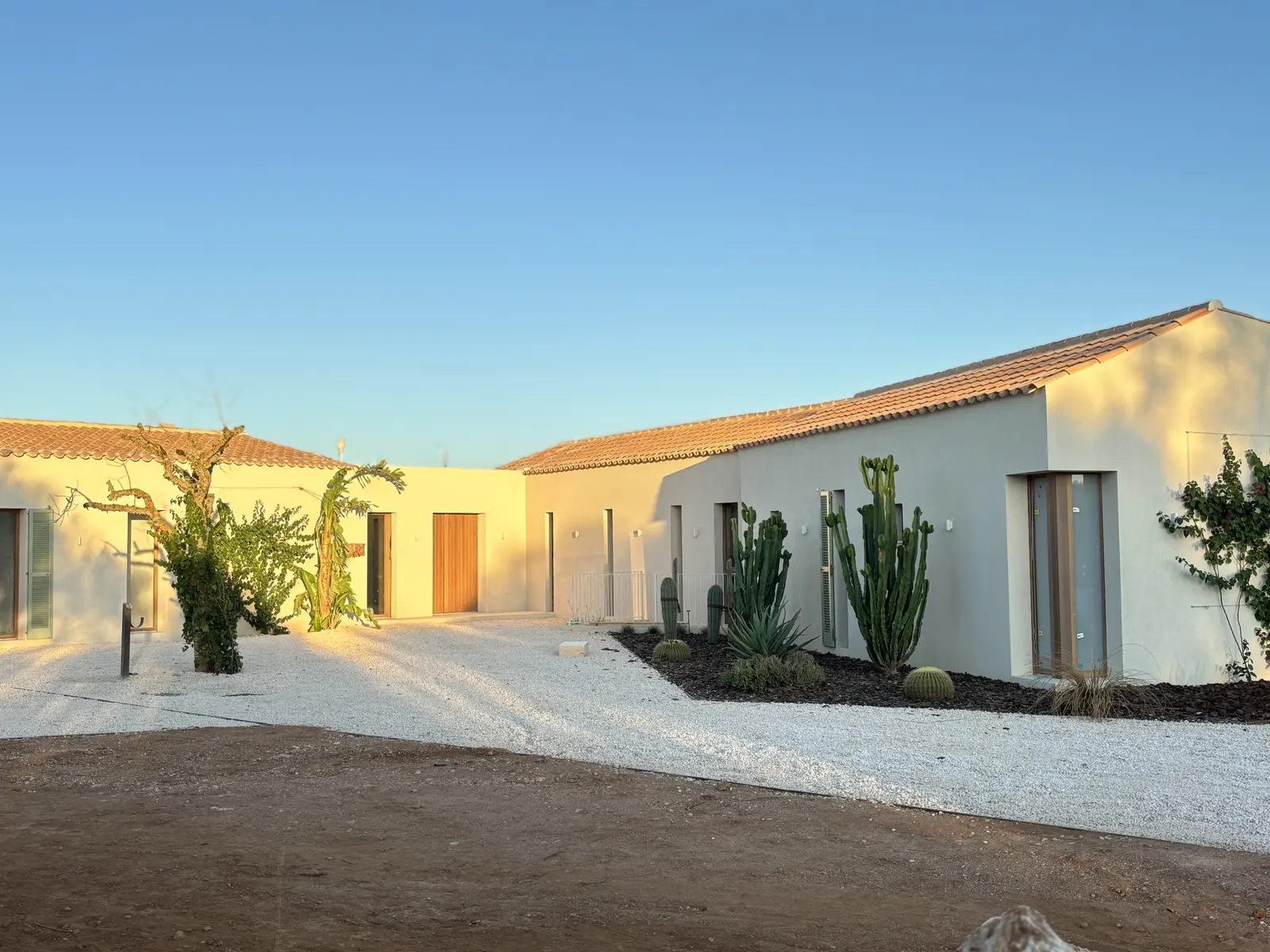 Driveway and courtyard in evening light