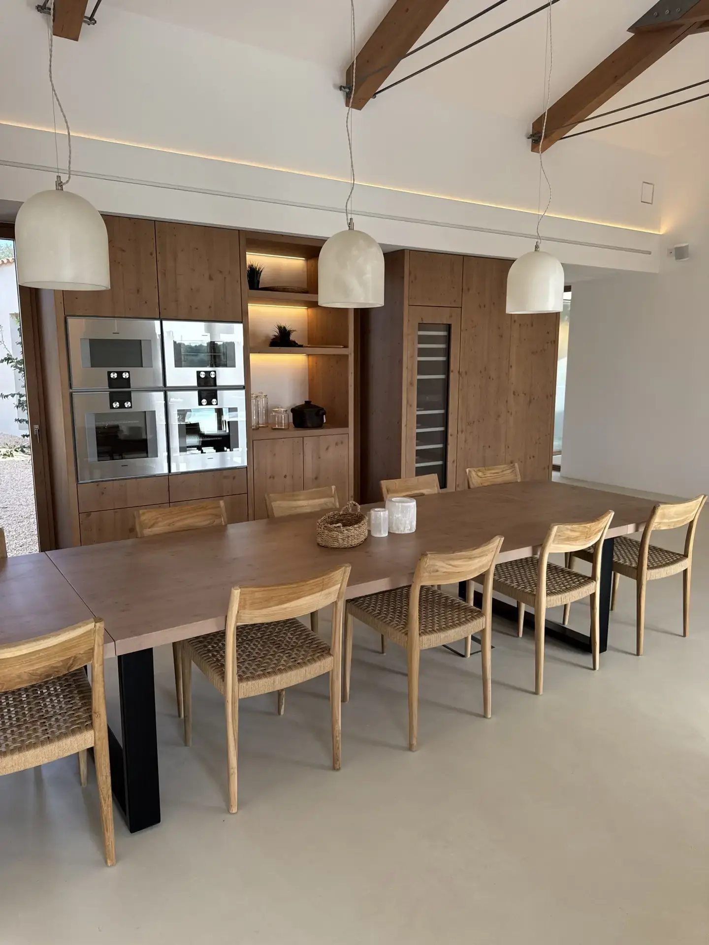 Kitchen with long dining table