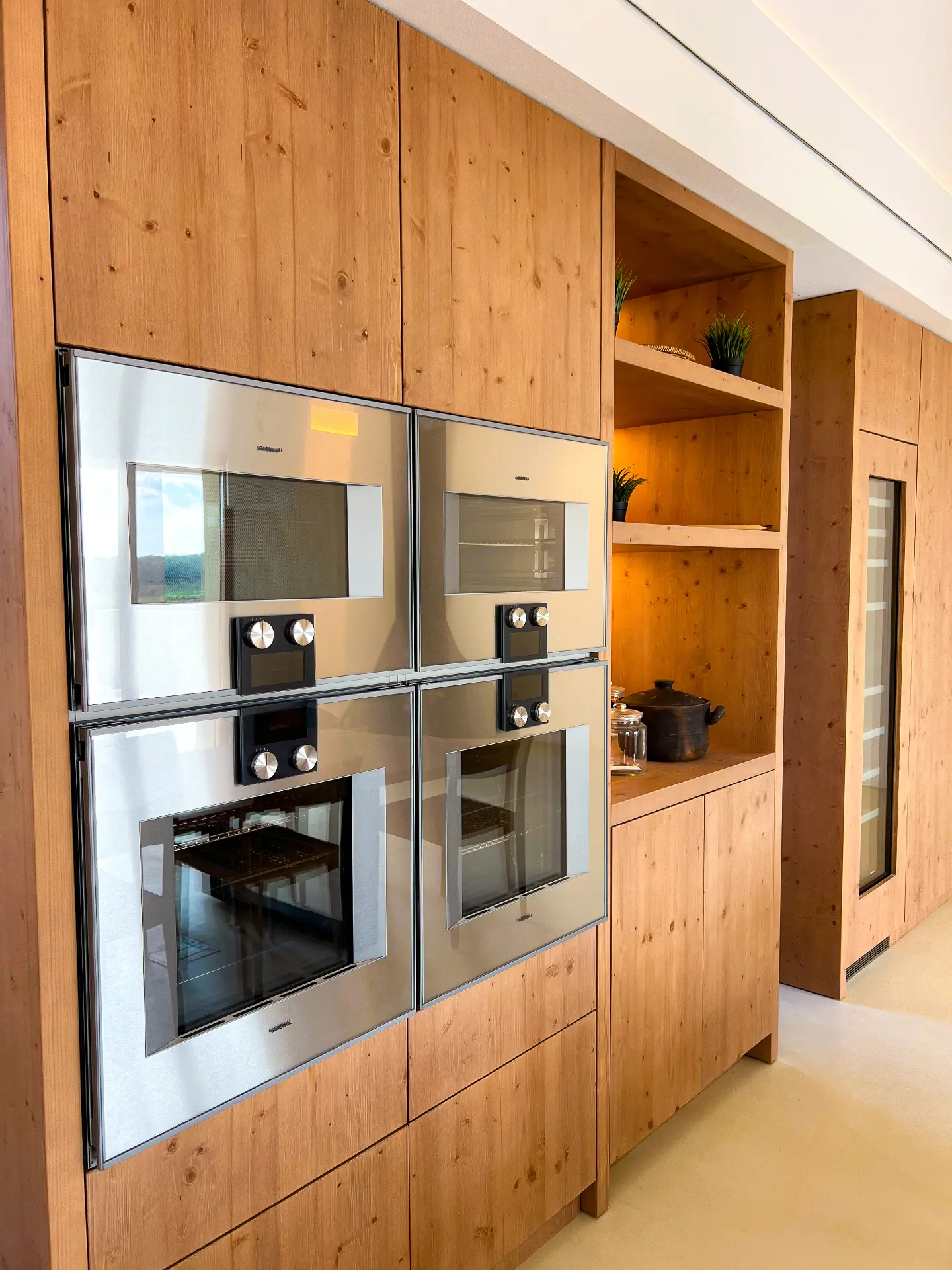 Reclaimed-timber kitchen with premium built-in appliances