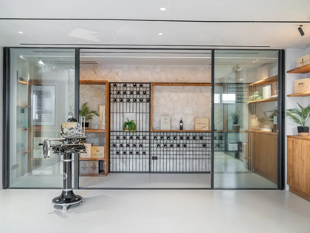 Wine cellar behind glass