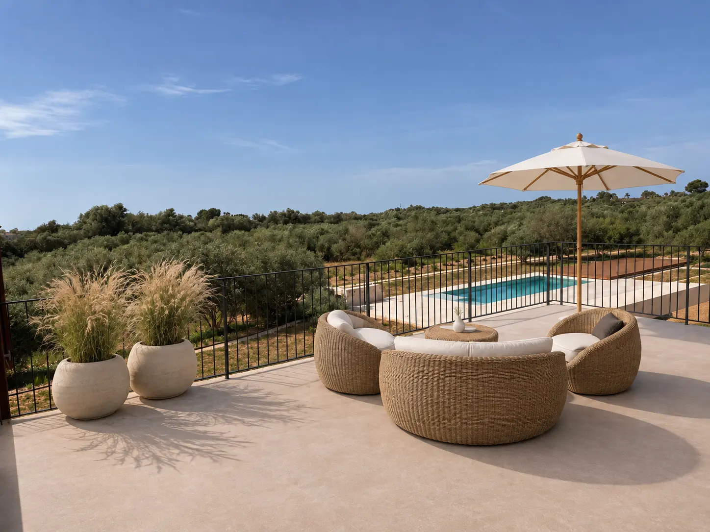 Roof terrace with lounge furniture and pool view
